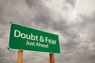 bigstock-Doubt-And-Fear-Green-Road-Sign-8148633